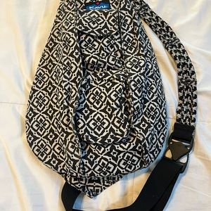 NWOT KAVU sling bag with rope strap.